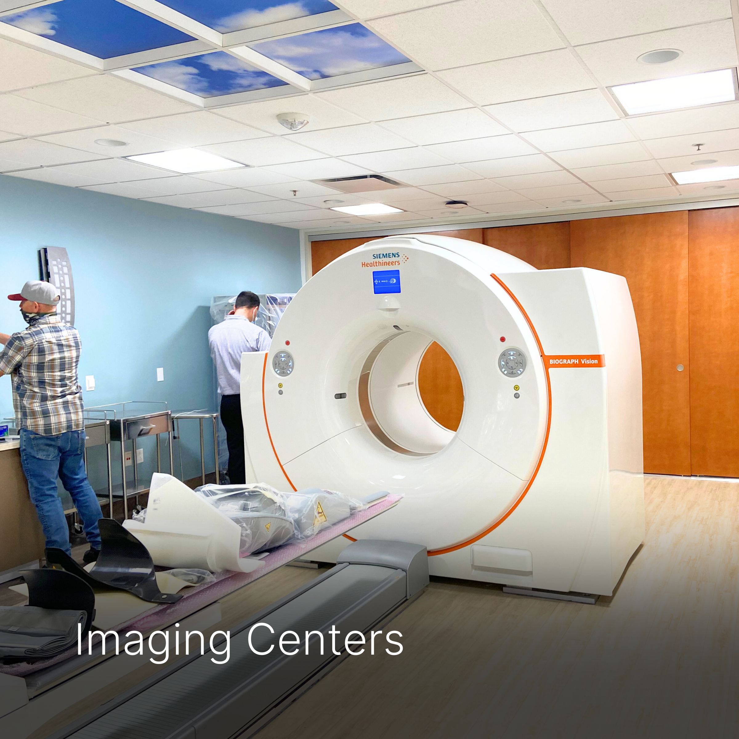 Imaging room with MRI machine and caption of Imaging Centers.